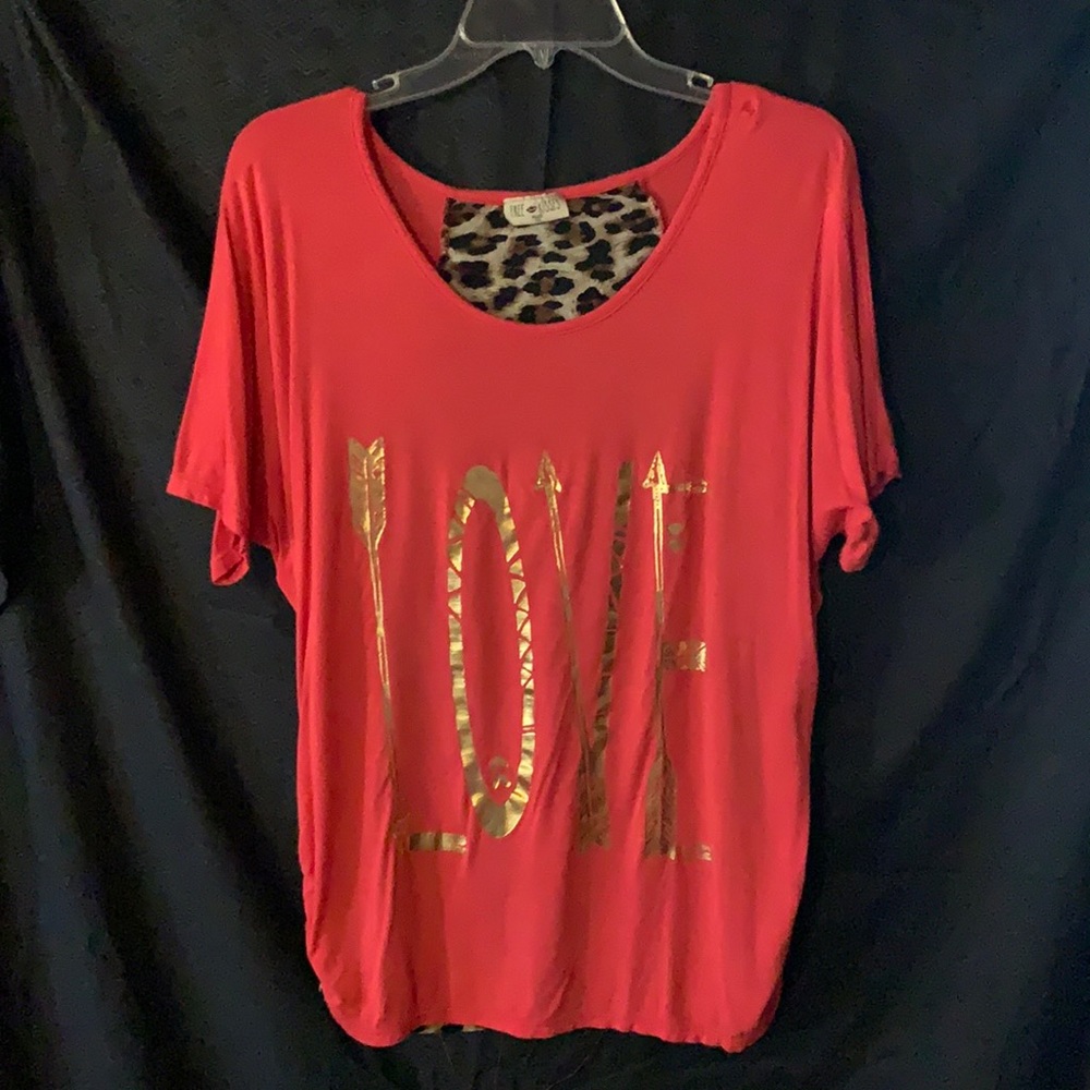 Free Kisses-peach colored top, gold print, animal pattern
